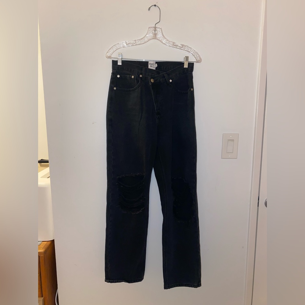 Black asymmetrical, ripped Princess Polly jeans
